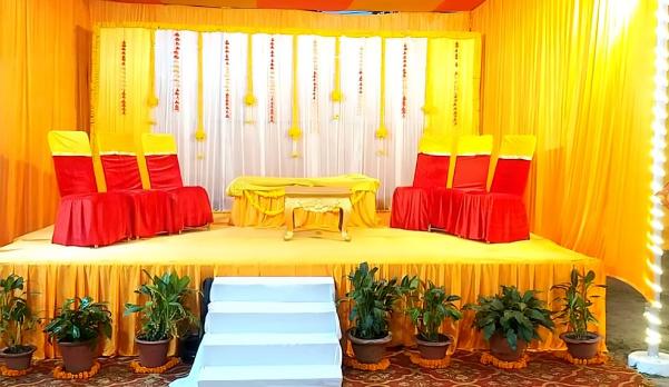 Sangeet Chic Decor - Vibrant drapes and fairy lights create a mesmerizing ambiance.